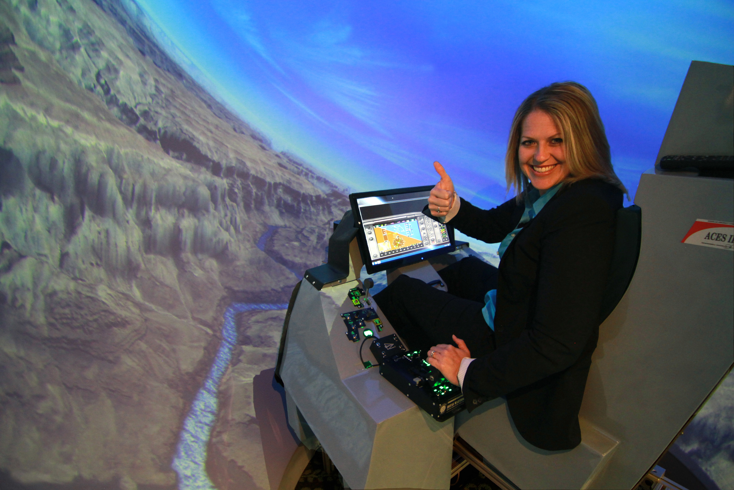 JSAA AEROSPACE COORDINATOR CAMI DEBISE TEST FLIES THE SURROUND VIEW FLIGHT SIMULATOR OVER THE GRAND CANYON