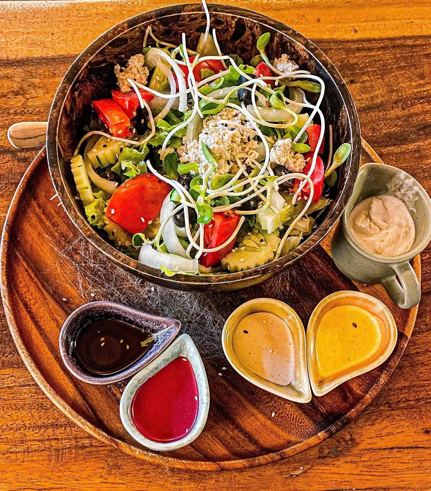 Lunching @pureveganheaven is heaven. ☮️🙏❤️
&mdash; This bowl is loaded with veggies, vegan feta and bean sprouts. 🌱 the sauces are all homemade and incredible