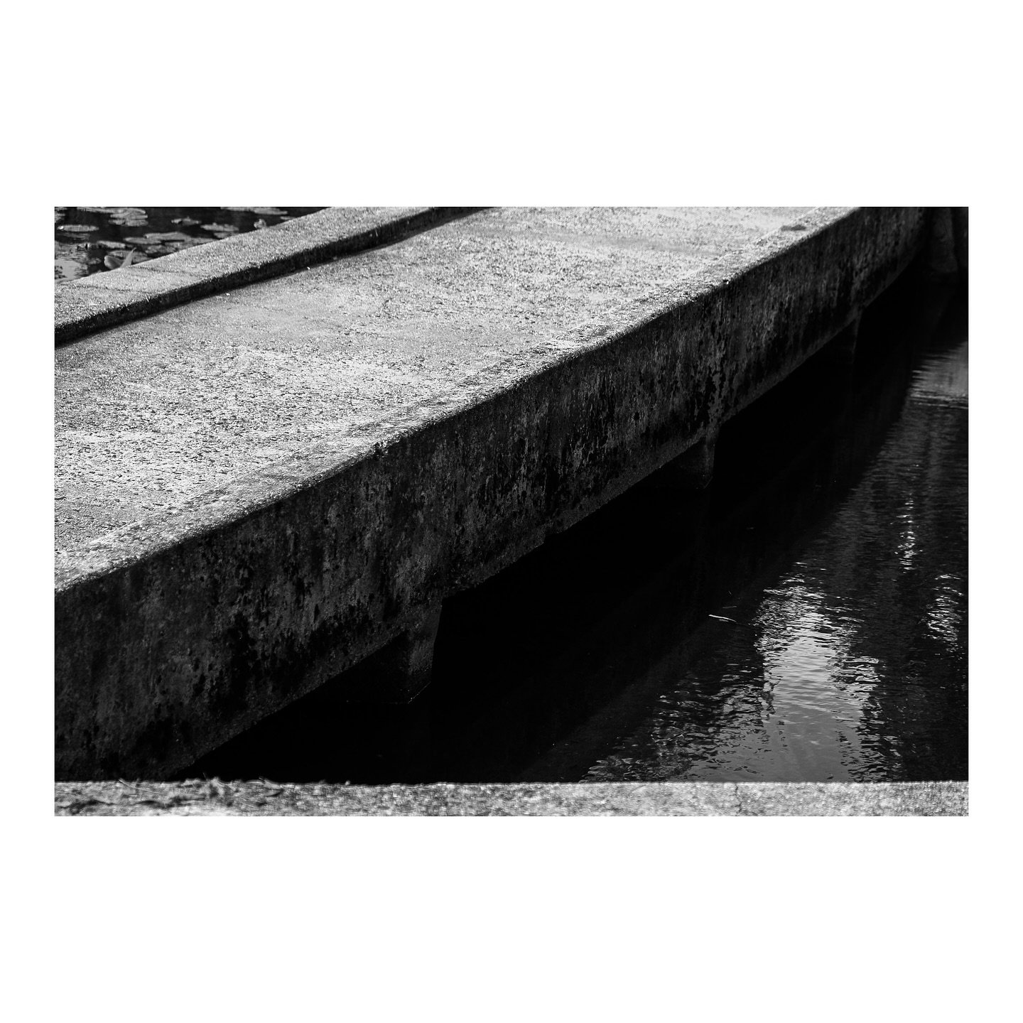 The little patch of grass on the bottom was bothering me but then we lost the wall in the top right and a portion of the water in the top left. It feels less contained without that wall.