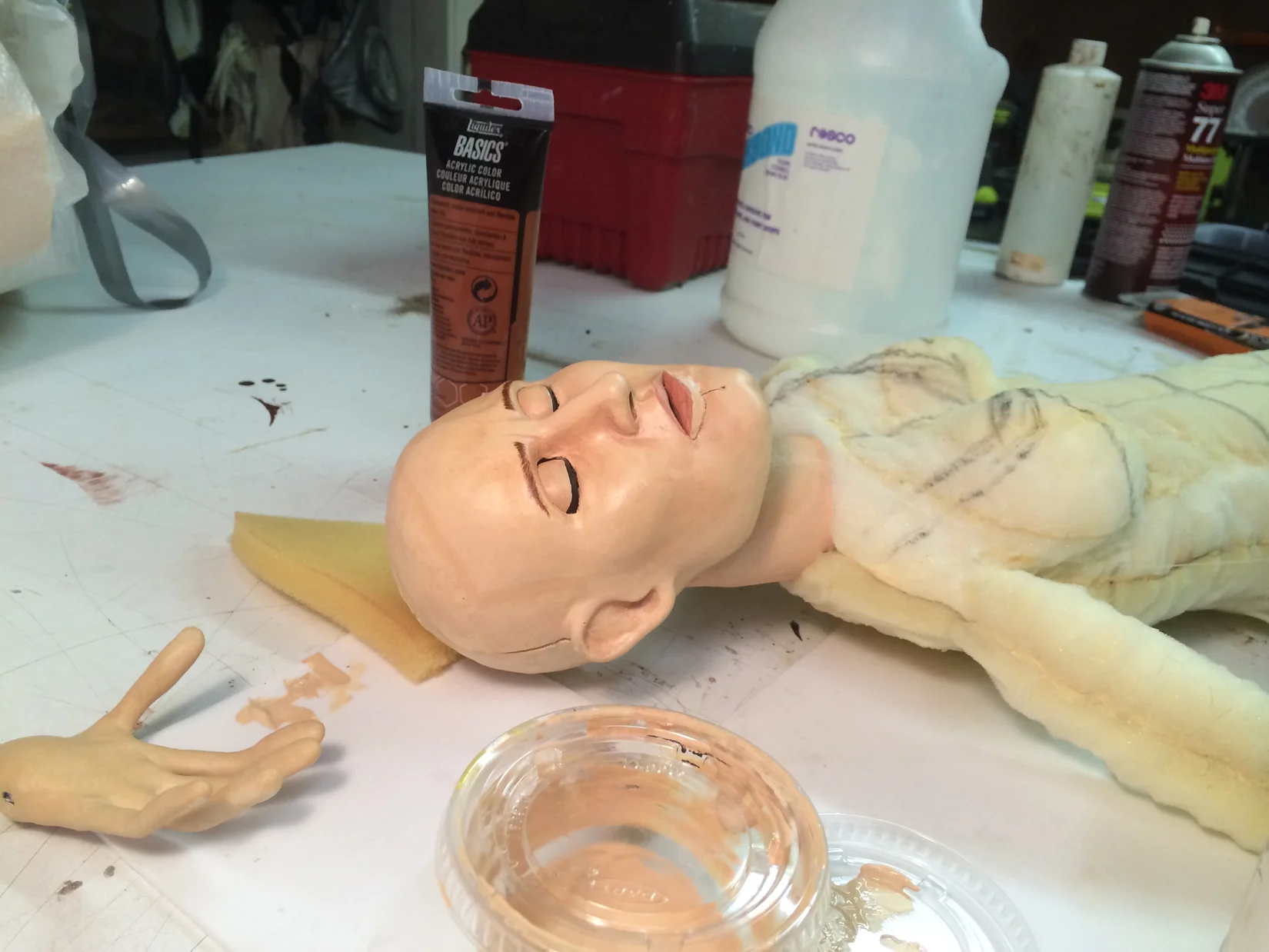Maggie Grace taking a nap before she gets her wig and costume.
