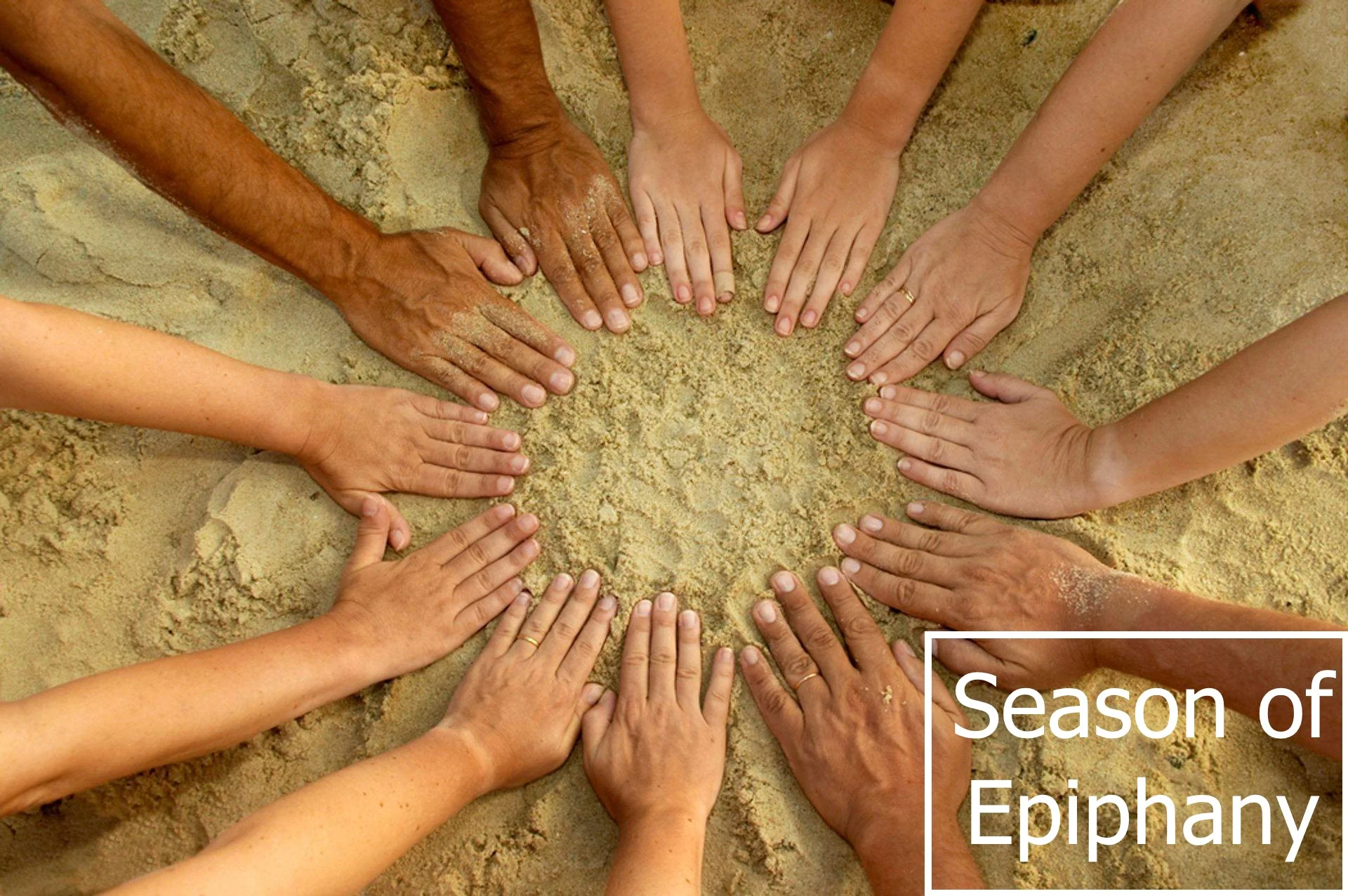 circle-of-hands-in-sand-1.jpg