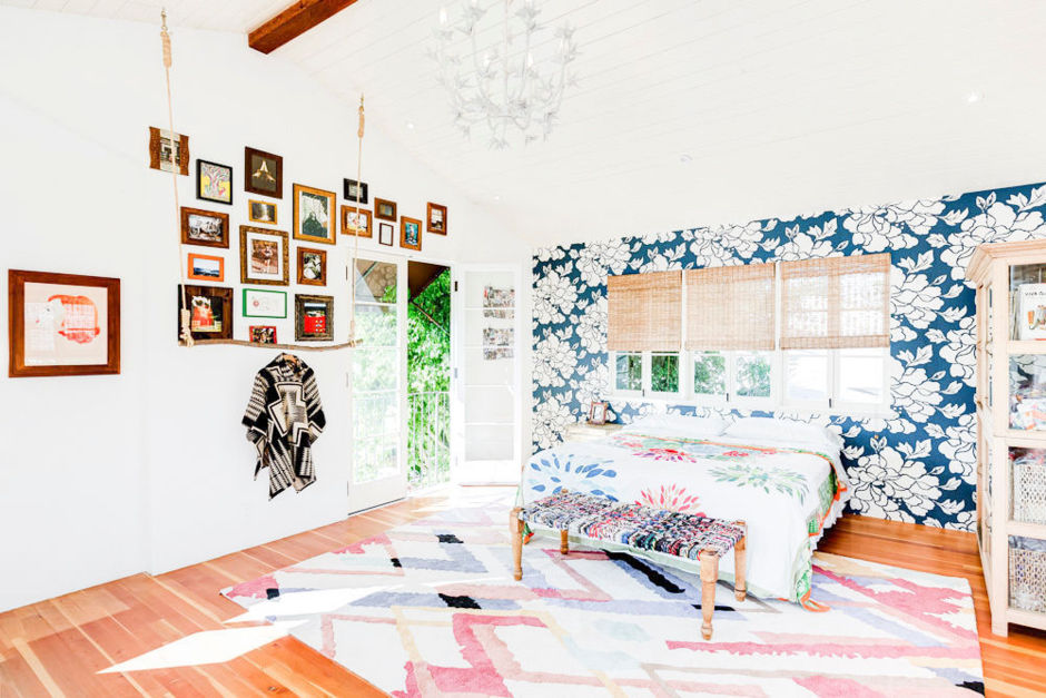Laura's studio/A guest area with an explosion of color from textiles she created including the rug! Jealousy is not a cute look on us but we are wearing it right now.