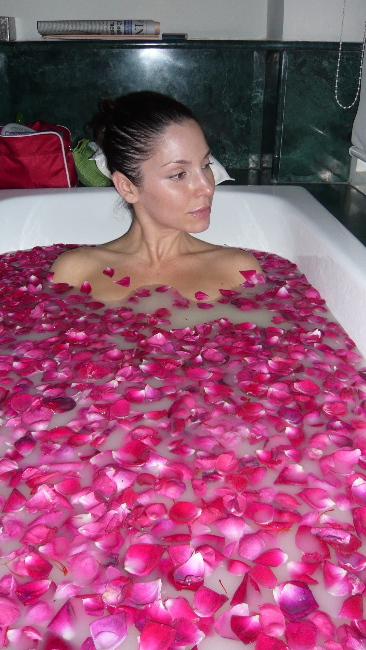Oh yeah this actually happened once upon a time! A rose, turmeric, coconut bath in India!. Now if I could only have that young, wrinkle free skin again...
