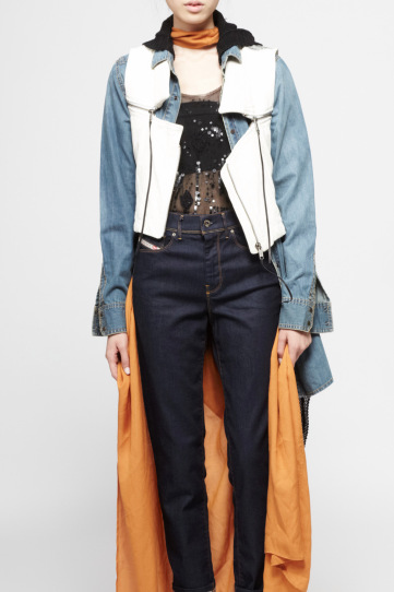 Look 3, styled by Jillian Amos Diesel leather vest, $450, denim shirt, $178, cardigan, $350, dress (worn as cape), $268, sequin tank dress, $298, and jeans, $148, at Diesel 5th Avenue boutique and Diesel.com How would you describe the look you styled? Diesel gone deconstructed. The look can be worn many ways. It is relevant to various consumers as they can choose to style it differently by highlighting other pieces. To each their own. What was the starting point for you when you put this look together? The denim was my starting point. I chose denim jeans with a 1950s high waisted fit paired with a denim shirt. That look is classic and never goes out of style. You can see someone wearing this outfit
walking the streets of downtown New York or London's East End. 