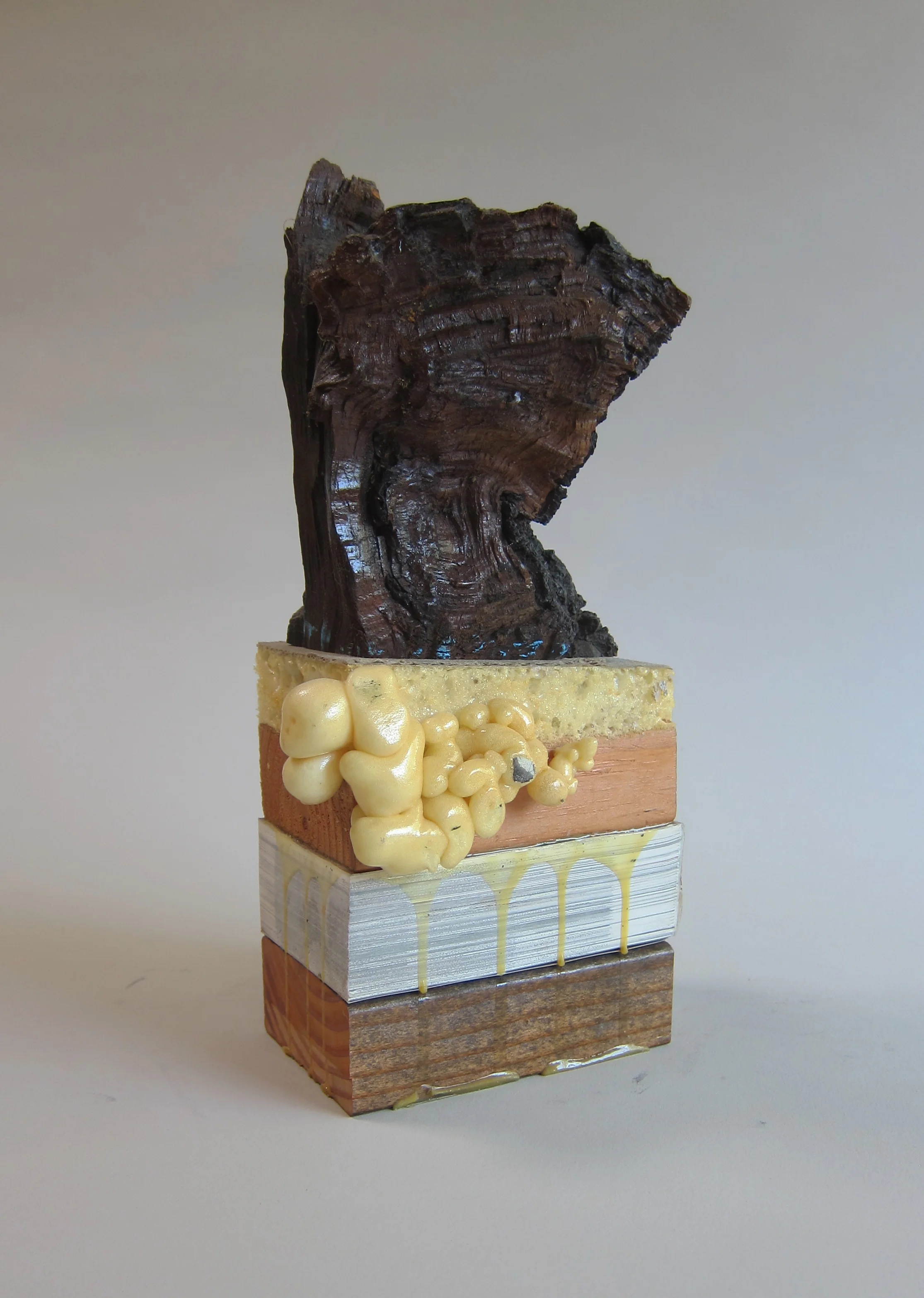  Wood, urethane foam, shellac, paper.&nbsp;  