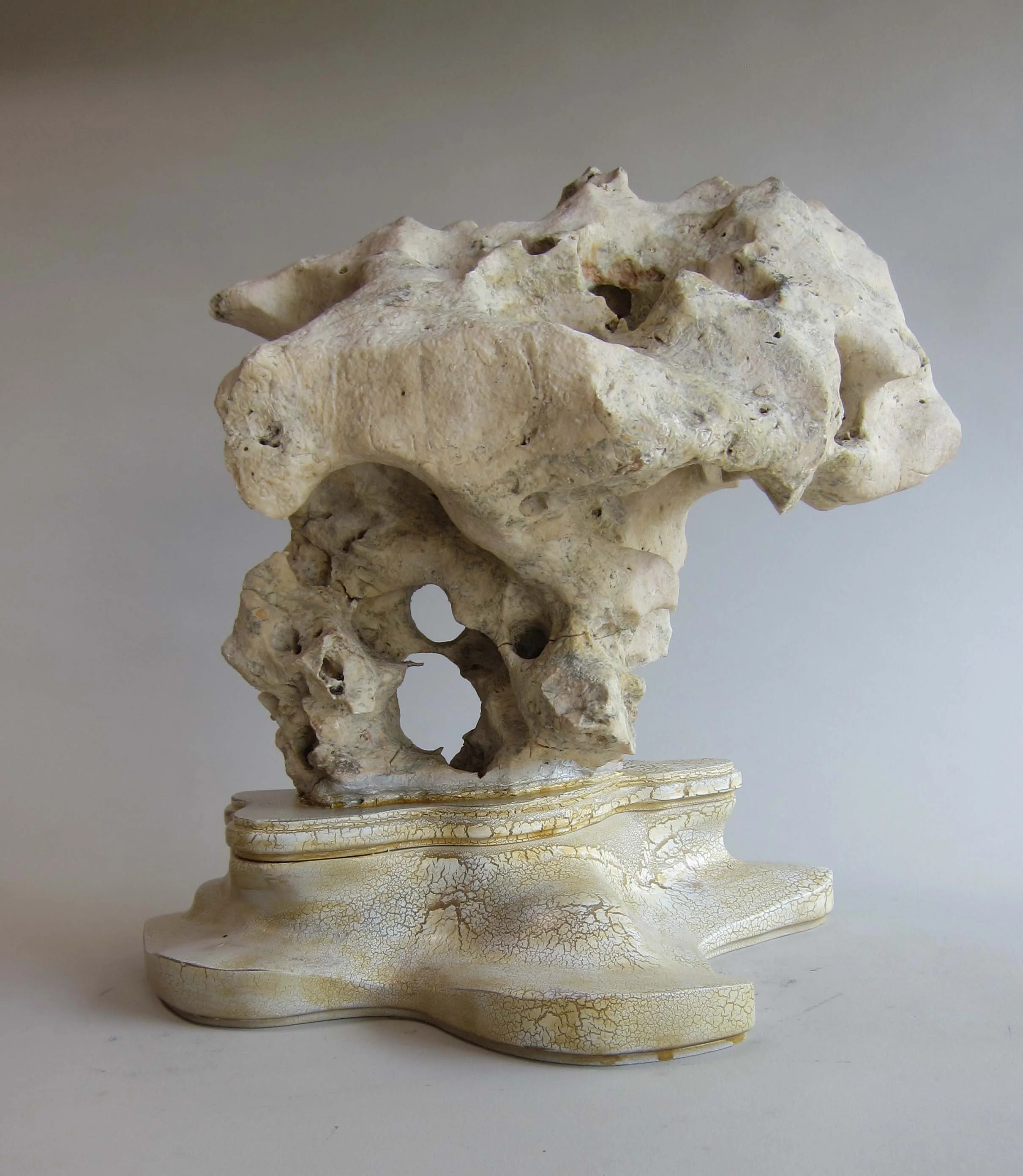   Indonesian limestone, wood, crackle glaze paint.&nbsp;  