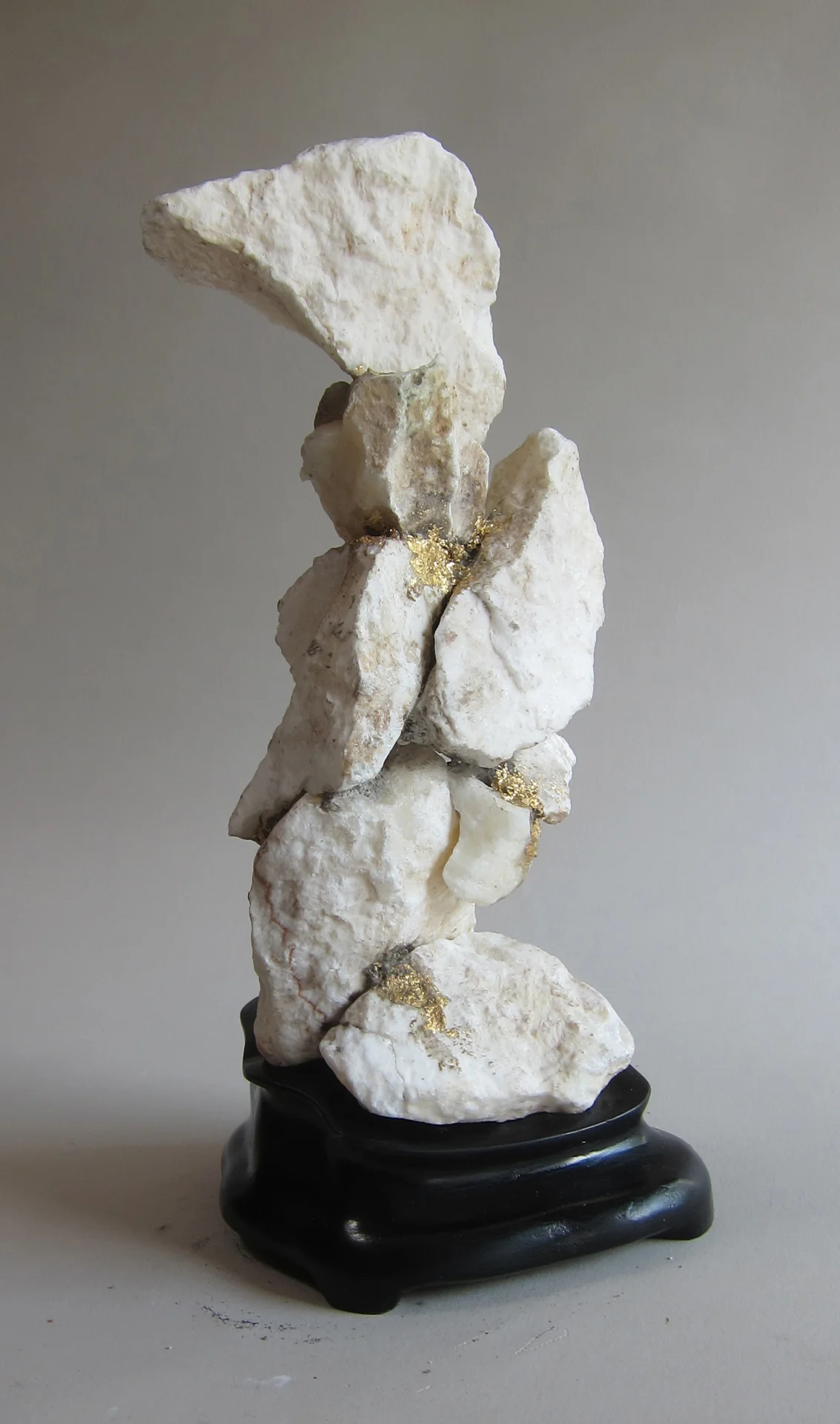   Snow stone, mortar, gold leaf, wood.&nbsp;  
