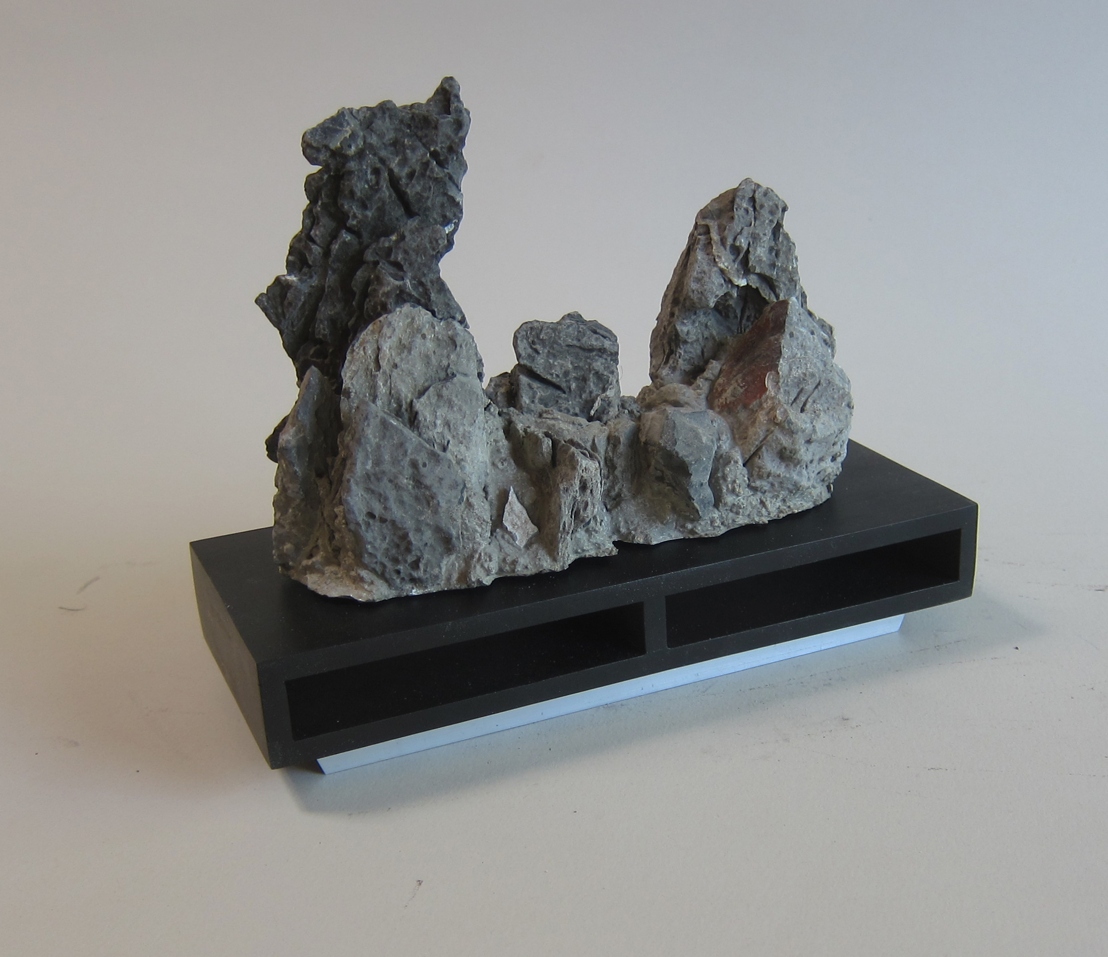   Chinese limestone, mortar, wood, aluminum.  