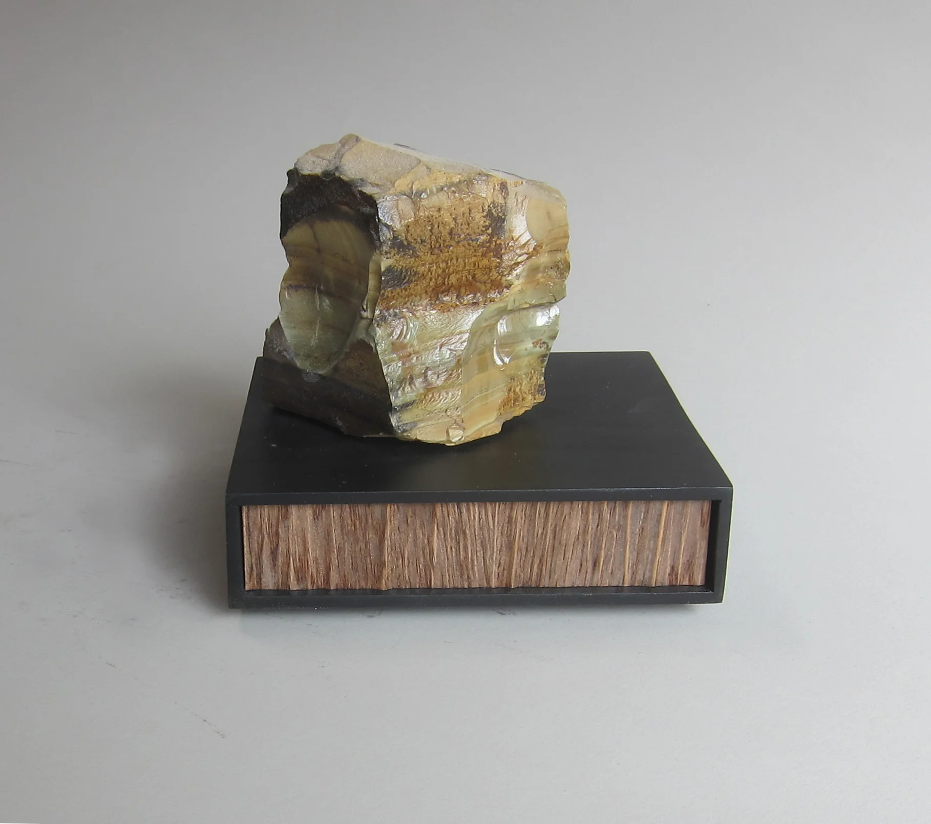   Arizona desert stone, wood, enamel paint, aluminum.  