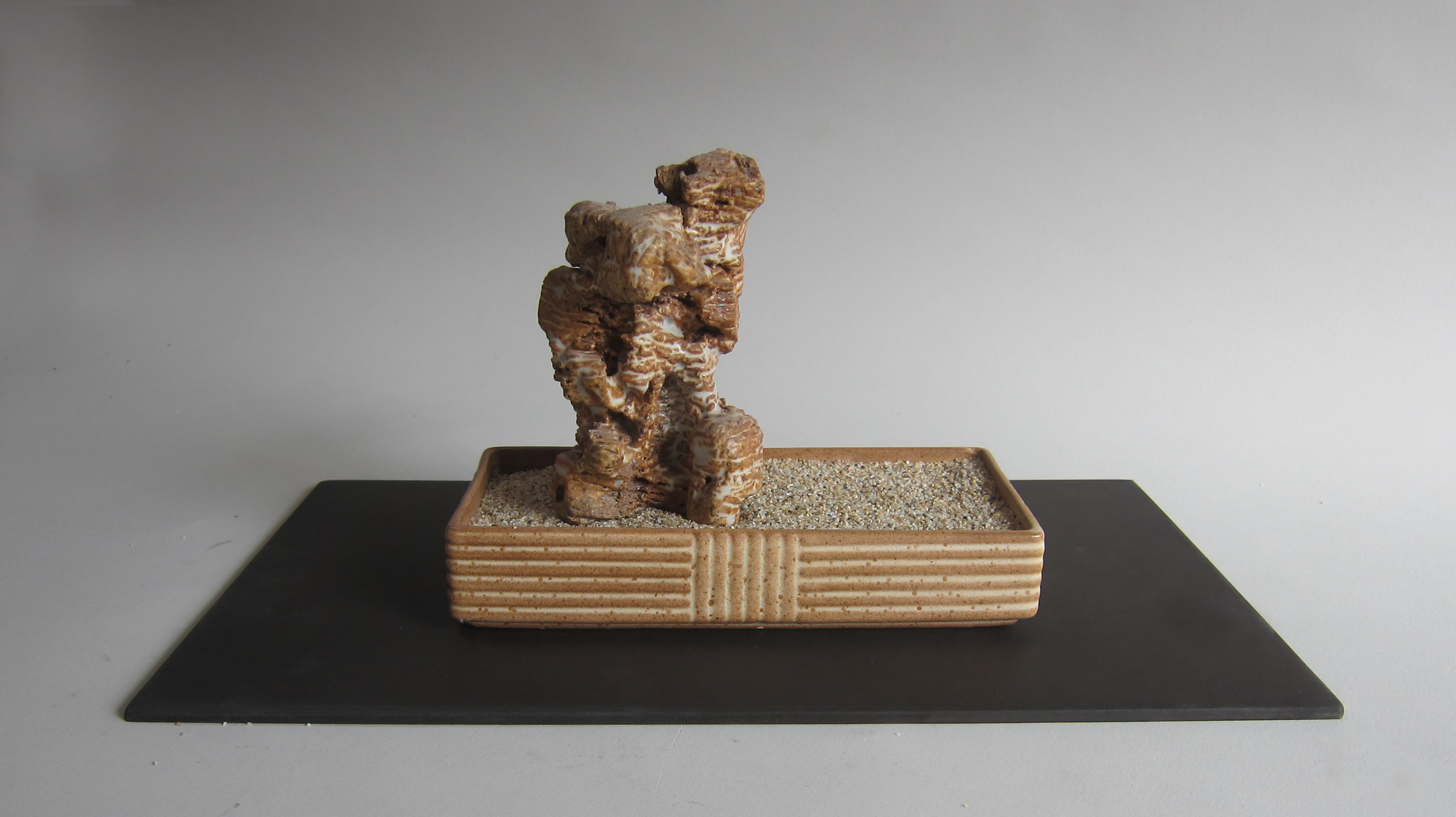   Ceramic, sand, midcentury ceramic, Masonite.&nbsp;  