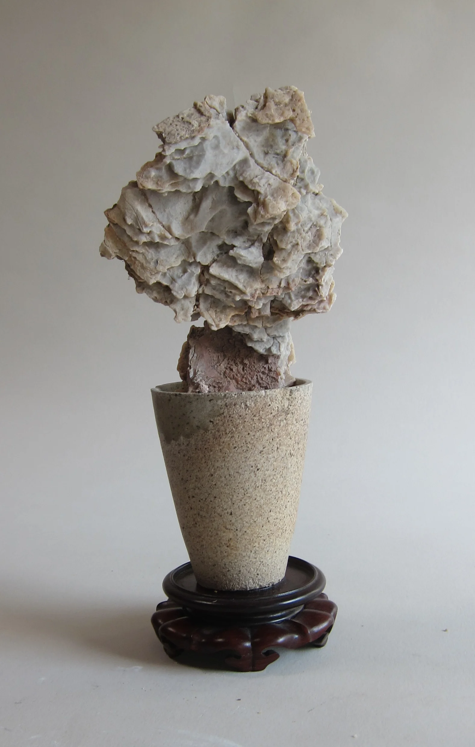   Mojave desert stone, ceramic foundry cup, wood base.&nbsp;  