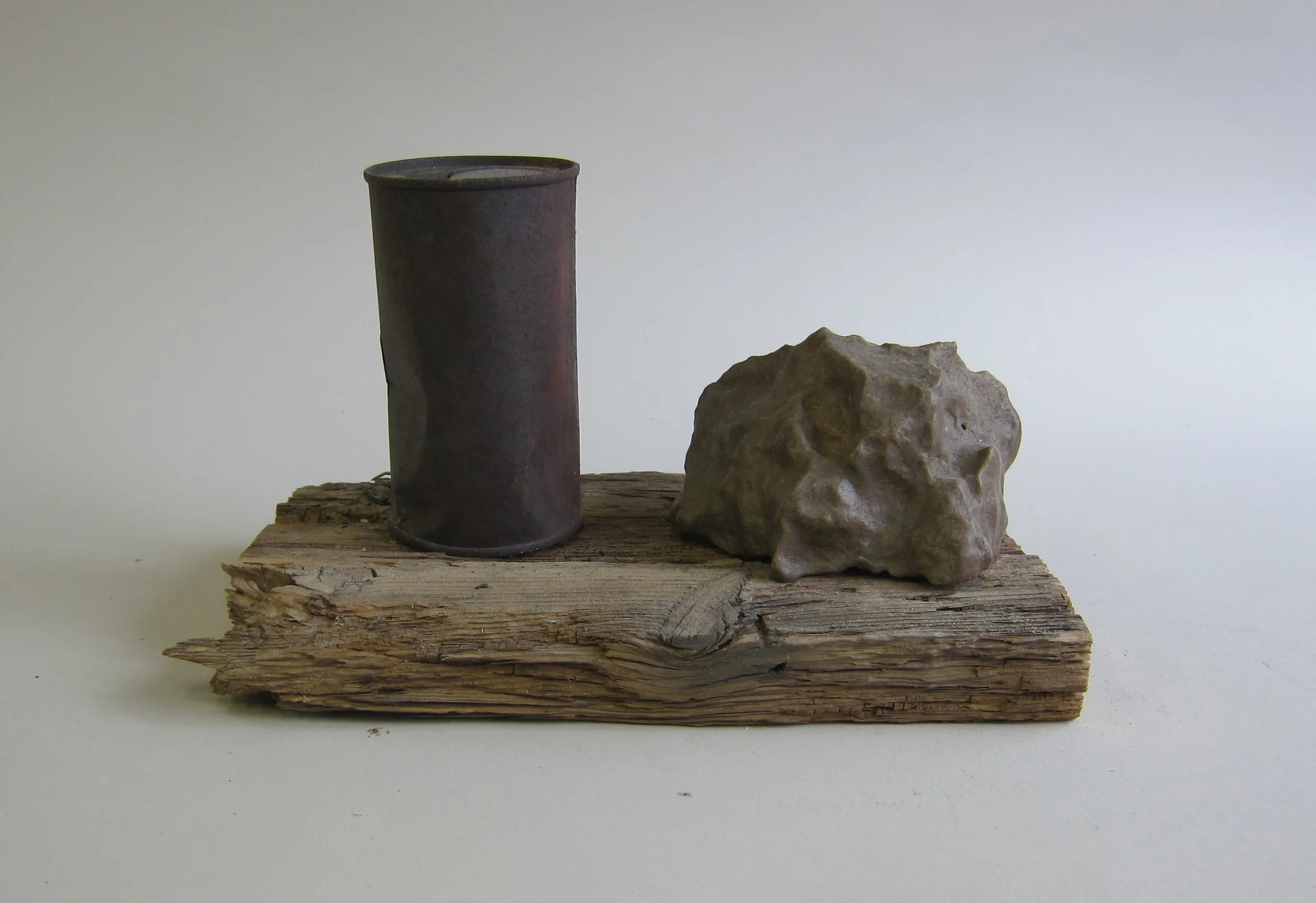   Yuha desert stone, rusted can, wood.&nbsp;  