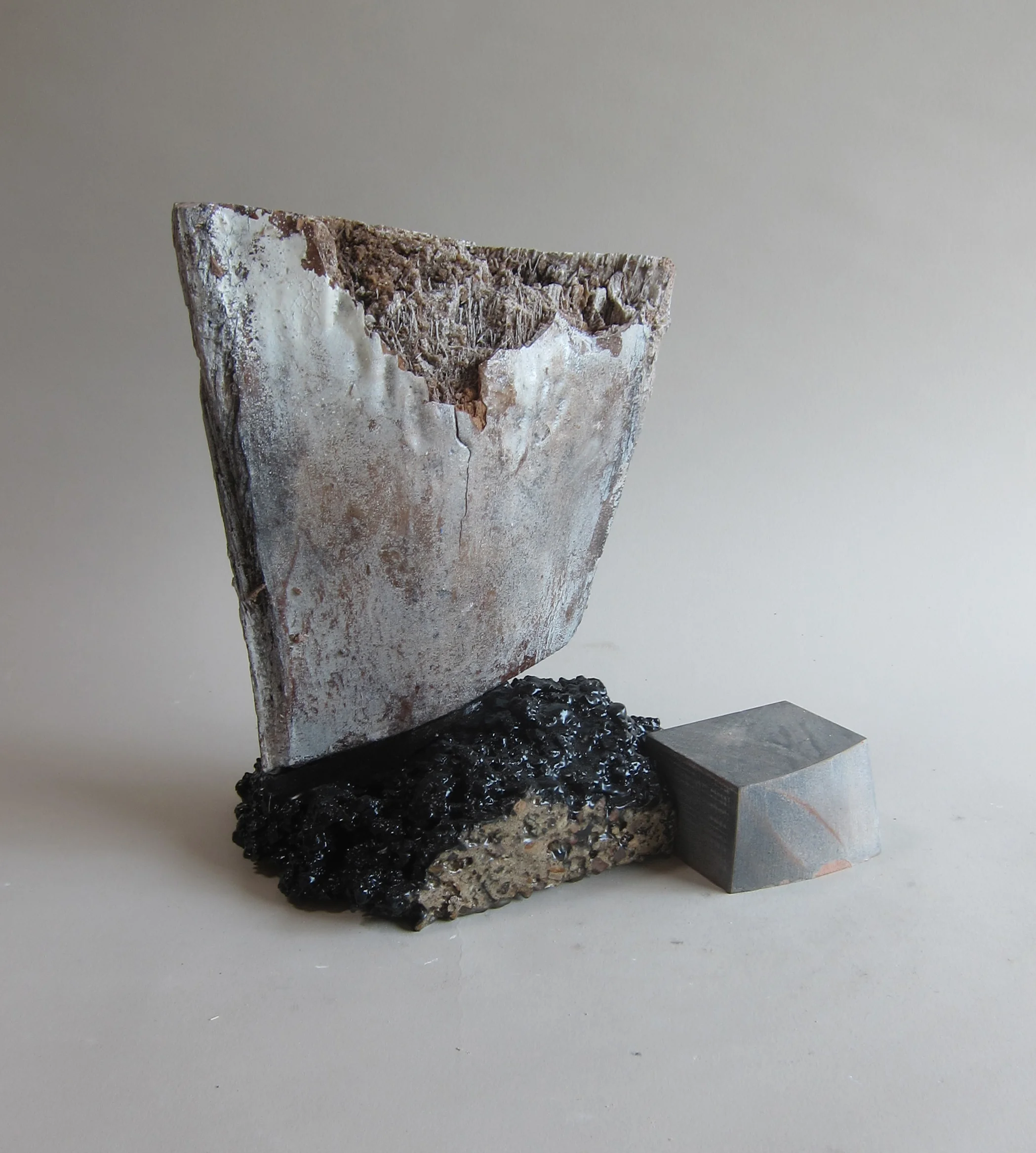   Palm frond, enamel paint, resin, concrete, wood.&nbsp;  