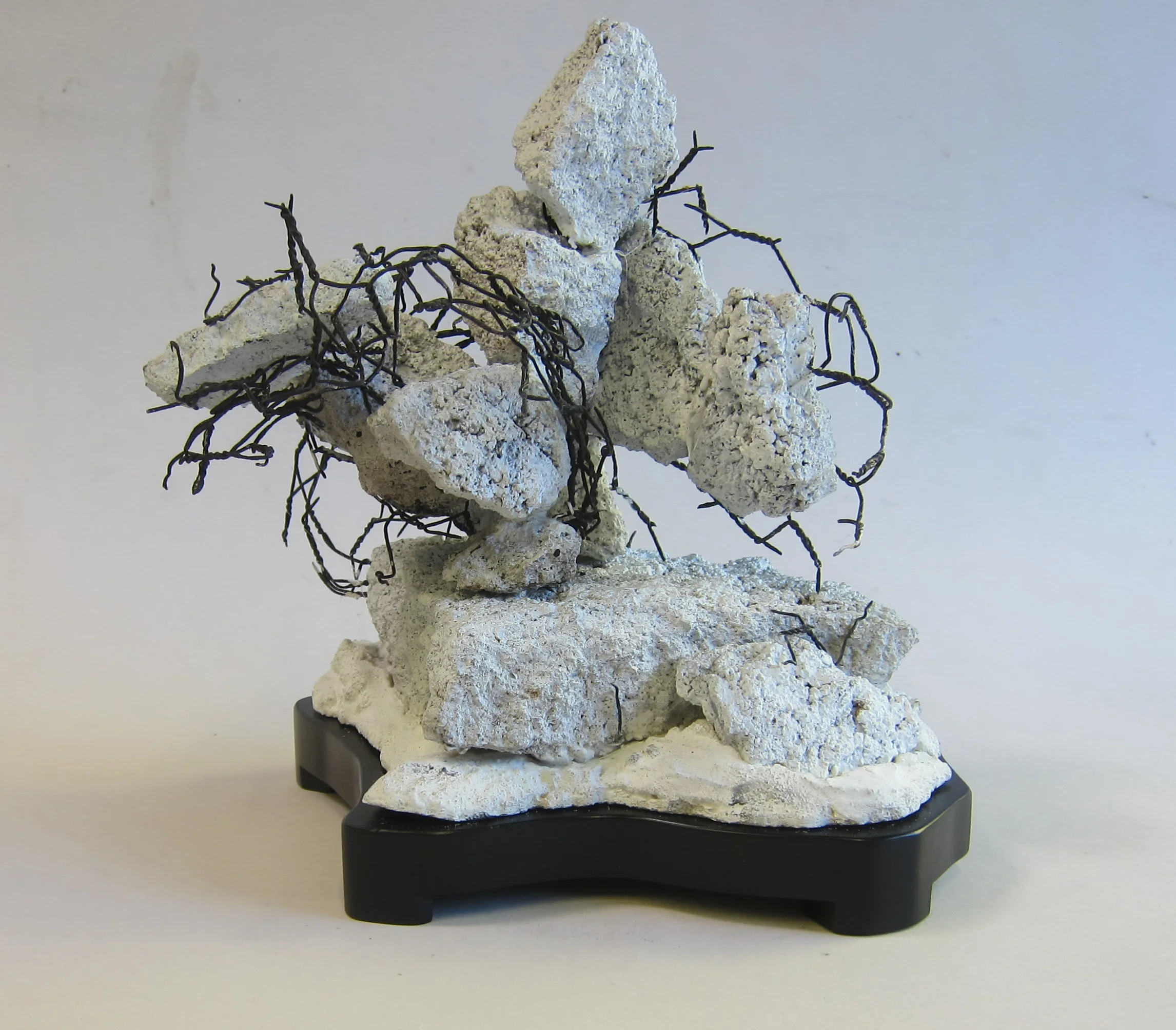   Cement, enamel paint, wire mesh, wood.&nbsp;  