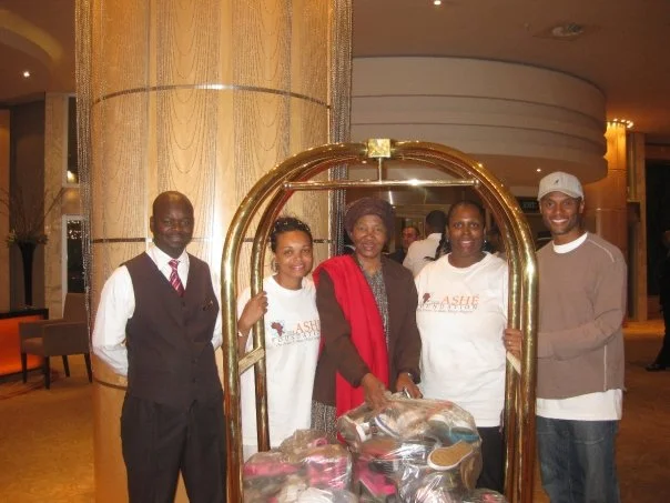 KL & ASHE Foundation Donating Shoes to the Mandela Family.jpg