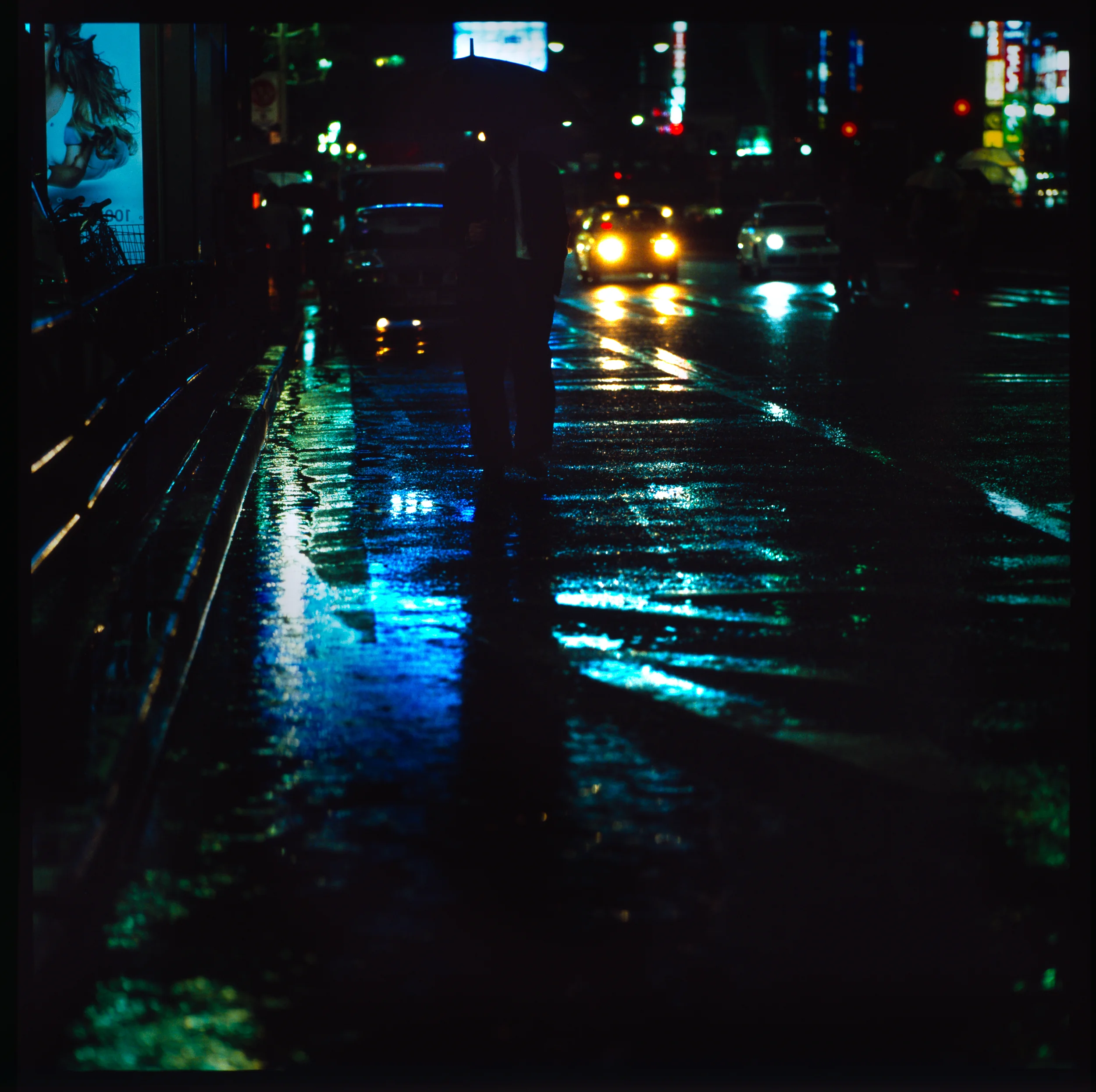 man in the street in the rain.jpg