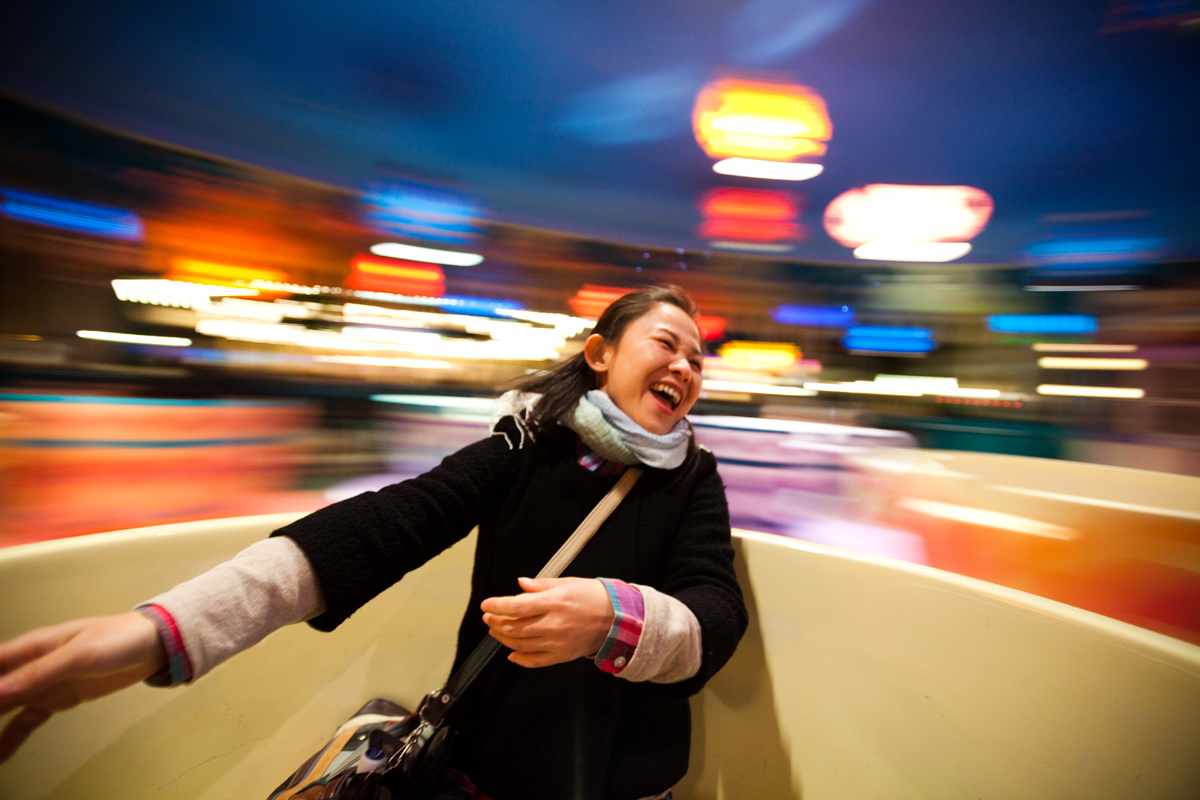 Fumi spinning in a cup at Disney Land
