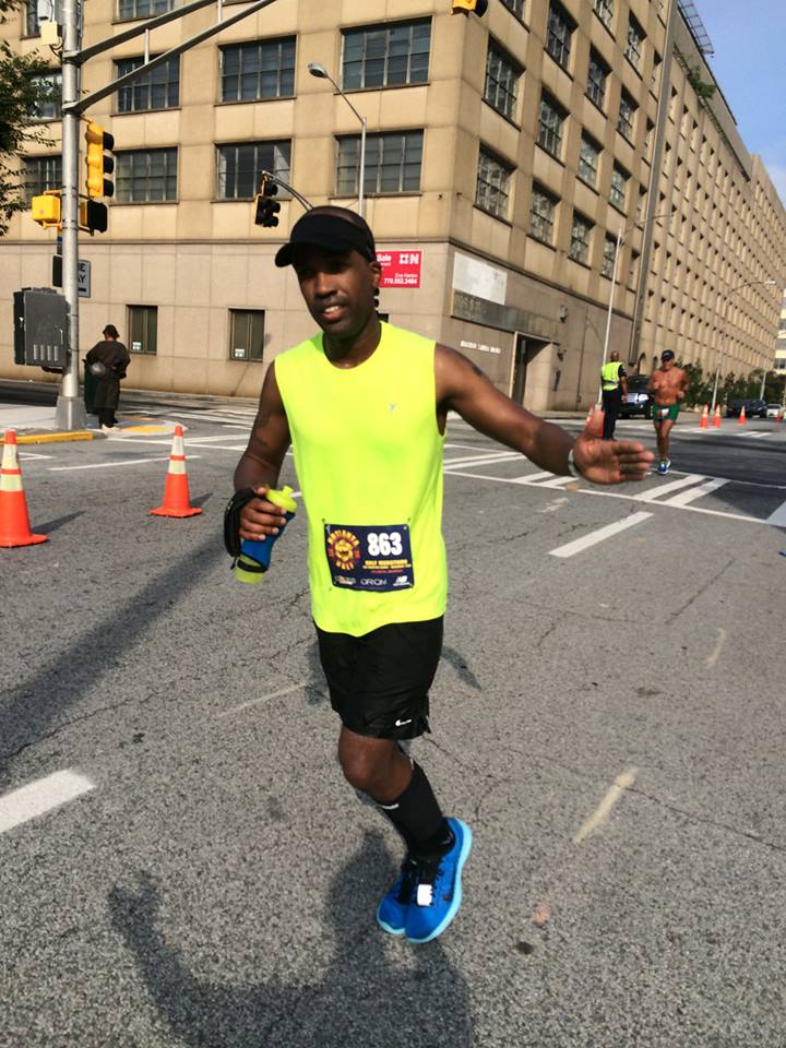 Me passing the BMR cheer zone during mile 12