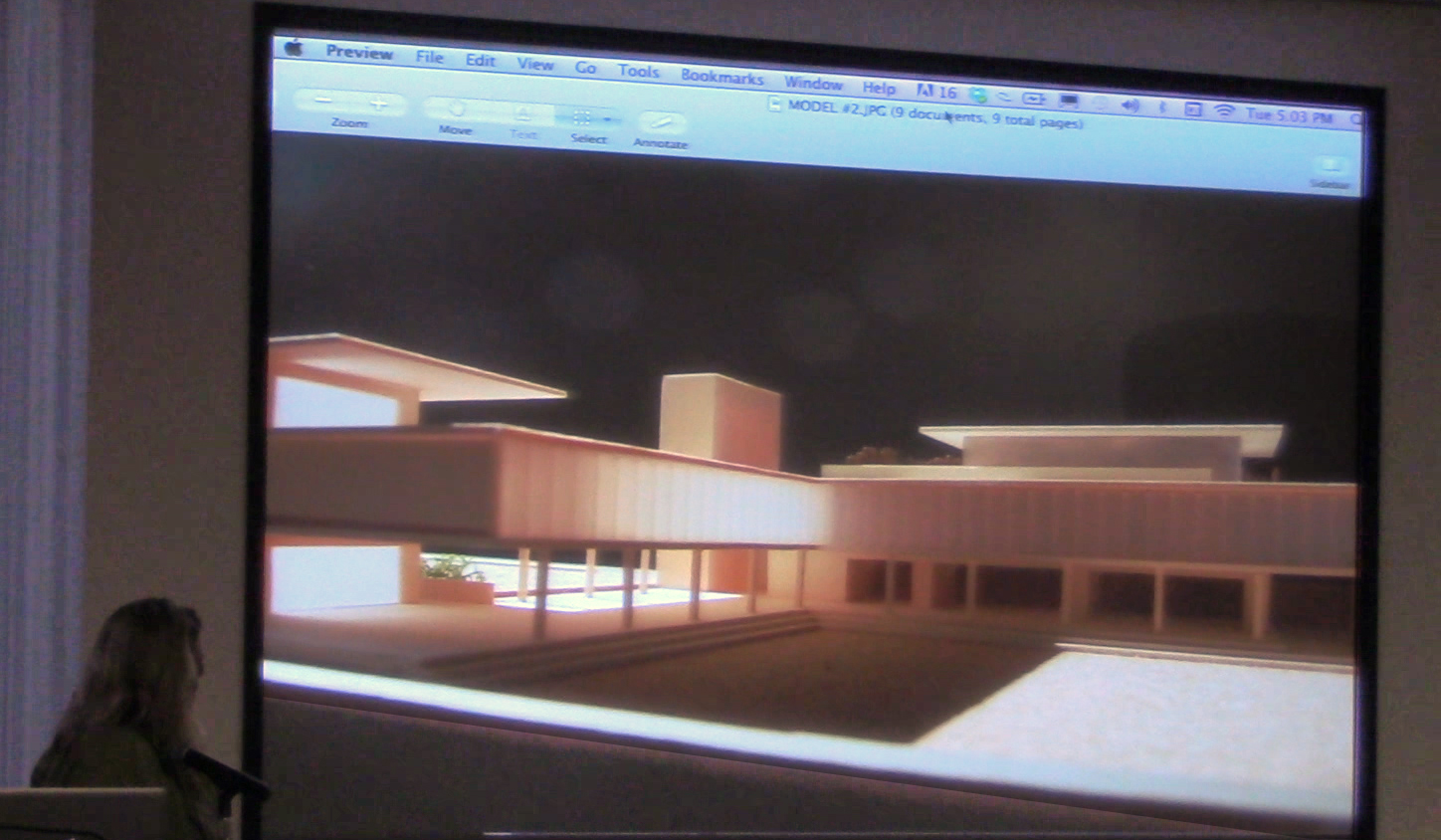 Geralyn Dreyfous shows the audience a still image model of Hope House, designed to be a save haven for girls in Calcutta, India who live in and around the red light district. Dreyfous is currently fundraising for this project.