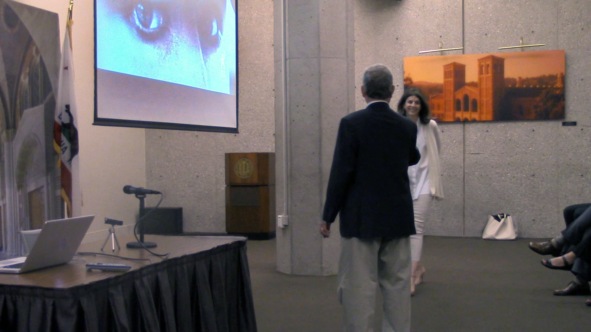 Peter Samuelson greets Amy Ziering at the UCLA James West Alumni Center.