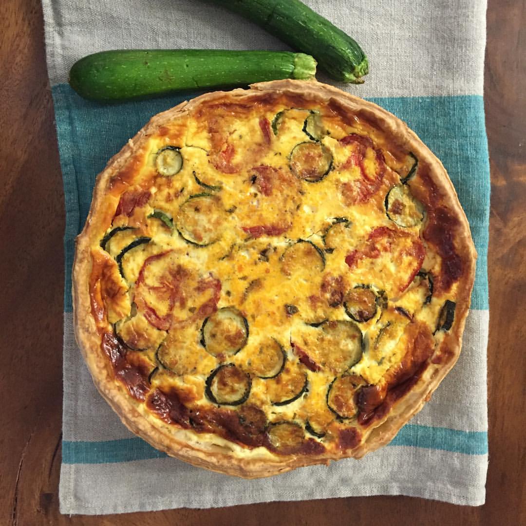 Fresh market zucchini & roasted tomato quiche is available at The Table on Elm (pictured above).