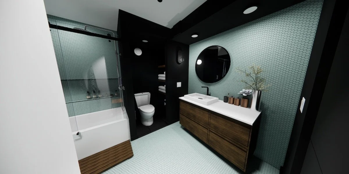 Dark slate tiles ad black paint mask out more private areas of the bathroom creating a sense of security.