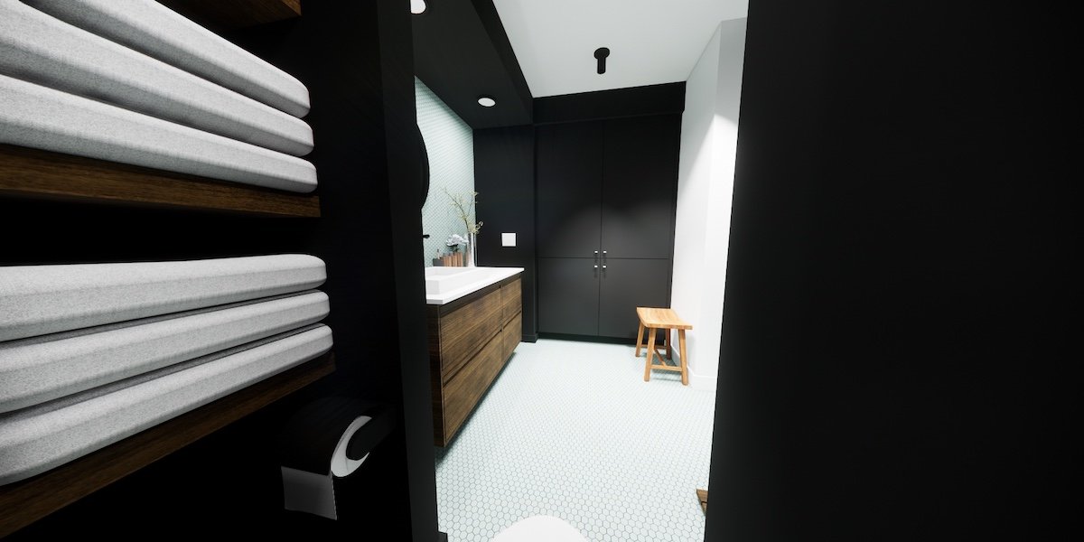 The storage spaces are carefully detailed with floor to ceiling millworker providing necessary space for toiletries and cleaning supplies. More regularly used items like towels are presented on warm wooden shelving.