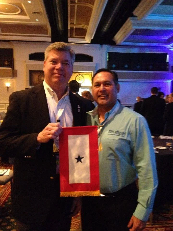 Blue Star Banner presentation to Scott Chapman of Lineage Logistics at AFFI.jpg