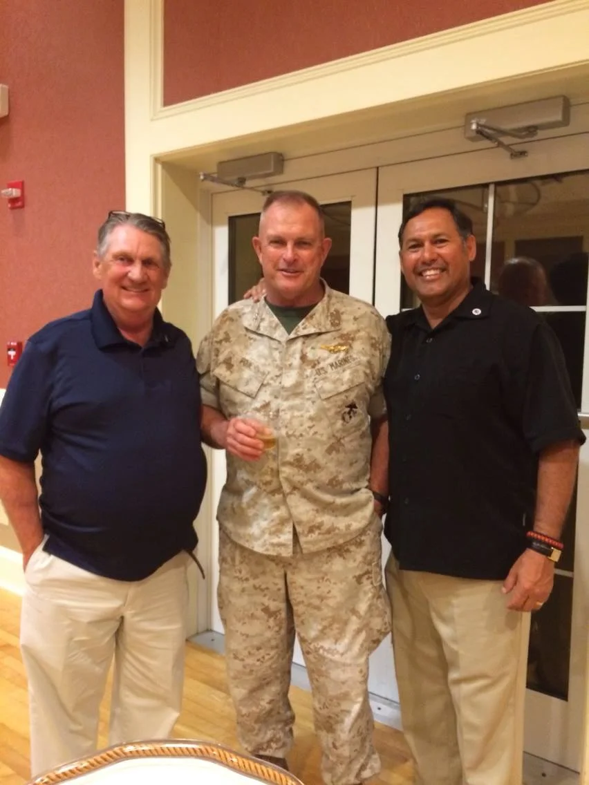 Johnny Harris and Marine Major General Raymond C. Fox and Paul Chapa at Major General Fox's retirement. 