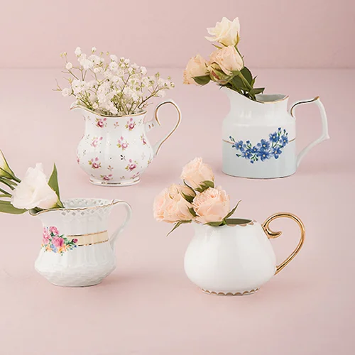 VINTAGE CREAMERS/FLOWER VASES