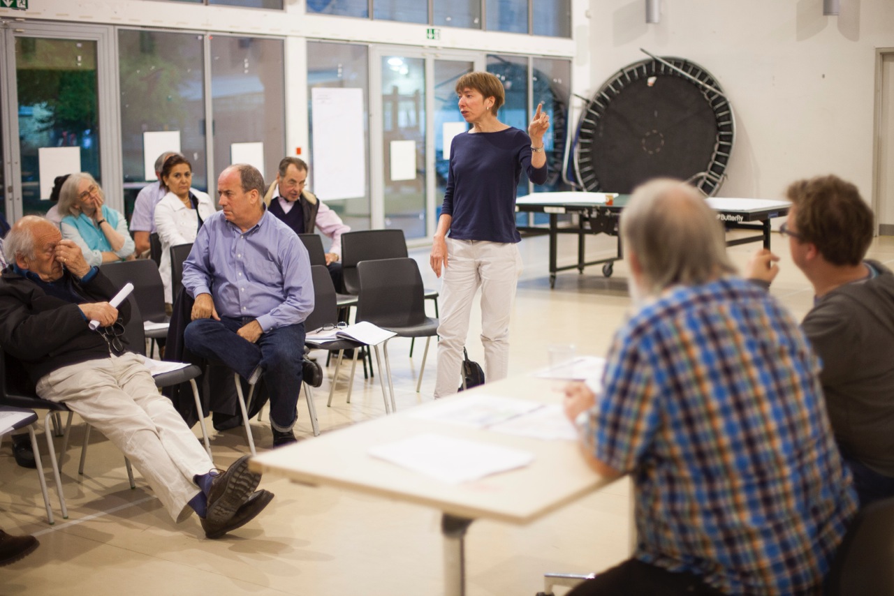 Lorraine Hart explains a technical point to a forum member at the Inaugural General Meeting.