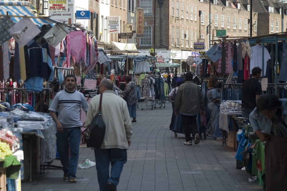 Petticoat Lane Market specialises in economy textiles. The stalls extend down Middlesex Street and along Wentworth Street