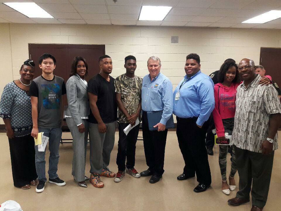 Pine Hills Public Safety Town Hall Meeeting 12/21/16 From Left to right, President of UFCF Sandra Fatmi, Taylor Nguyen, Commissioner Victoria Siplin (District 6), Darius Flores, Arry Rendel, Commissioner Bryan Nelson, President of FLU Julien O'Neil, Christelle Suffrena, First VP/Treasure UFCF Dennis Hall.