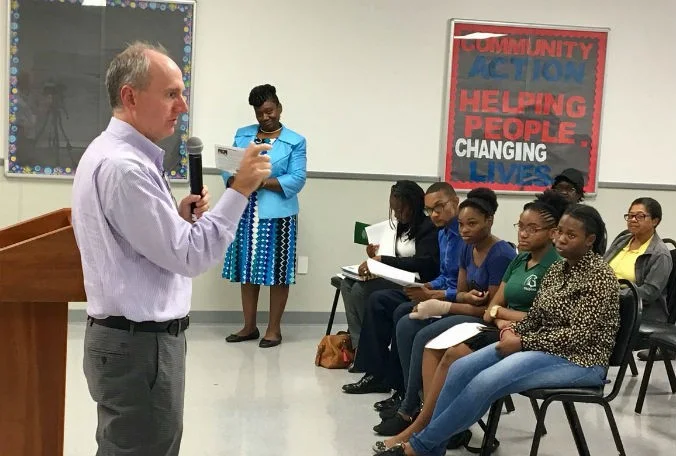Students from Future Leaders United at Evans High School attended the Pine Hills community meeting Tuesday and engaged Orange County Tax Collector Scott Randolph on taxes and the budget. (Erin Murray, Staff)