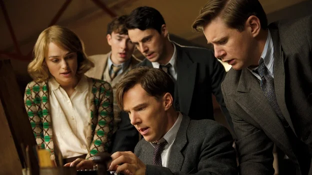 Benedict Cumberbatch, Keira Knightly and Matthew Goode with an Enigma Machine in The Imitation Game