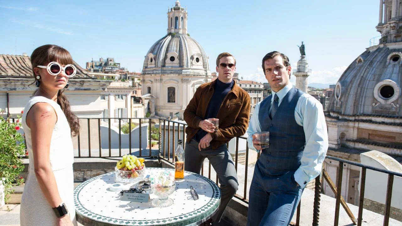 From Left to Right: Alicia Vikander as Gabby Teller, Armie Hammer as Ilyia Kuryakin and Henry Cavill as Napoleon Solo. 