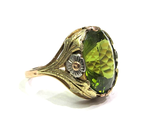 14K yellow, rose, and green gold ring with a 7.81ct peridot, at Gray & Davis.