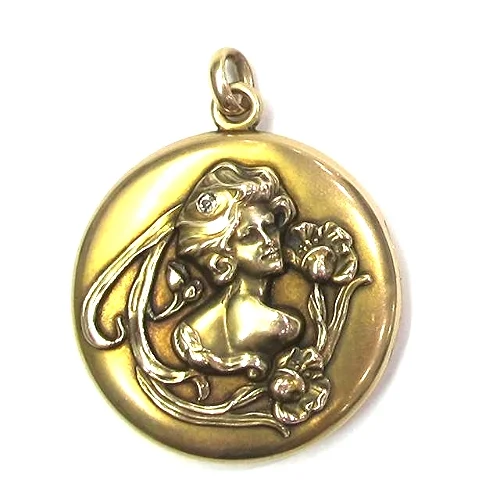 14K gold and diamond locket, at Gray & Davis.