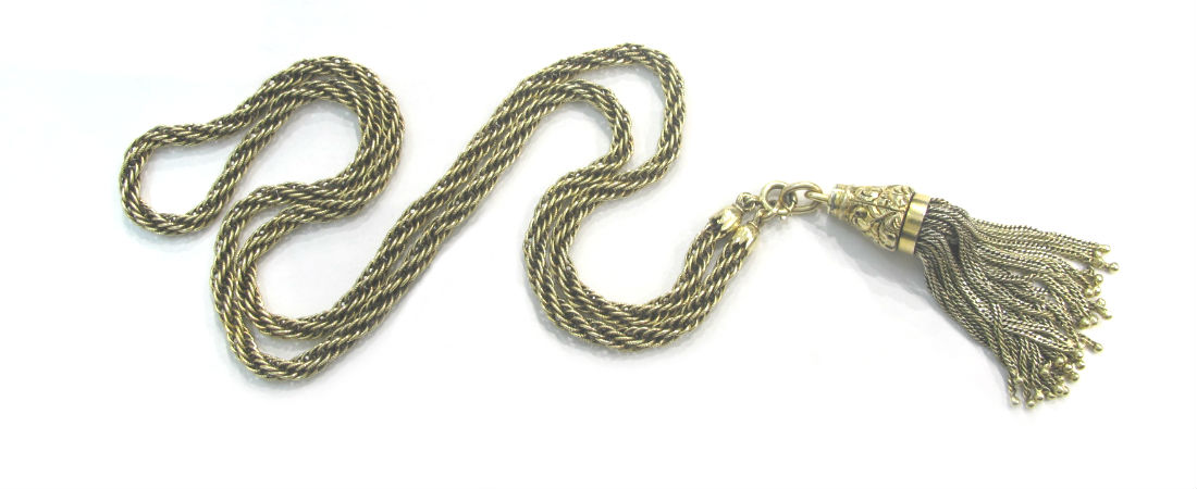 Mid-19th century 14k gold tassel with floral, hand engraved detail. Featured on a 14k gold 25" rope chain. Both available at Gray & Davis.. 