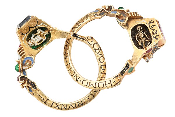 Renaissance gimmel ring which splits apart to reveal the Latin inscription "What God has joined let no man put asunder." Also hidden inside are a tiny baby and skeleton, to remind the happy couple of the fleeting nature of life. We may have seen this same ring at a different exhibition in the past... 