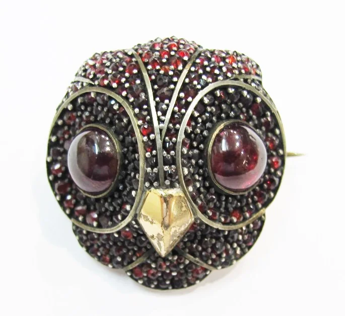 Brooch. 9k gold, Bohemian garnet. 19th century. Currently available at Gray & Davis.