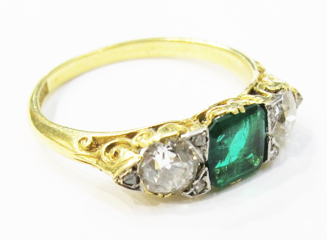 Victorian emerald & diamond ring with scrollwork detailing. 