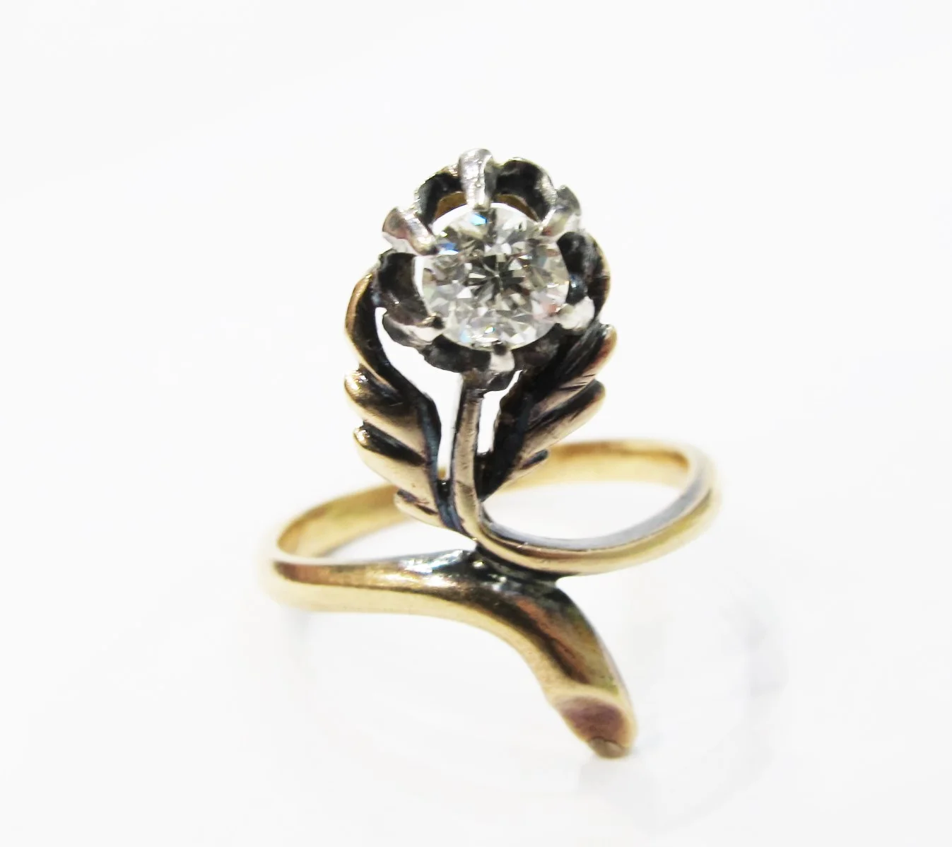 Art Nouveau peacock feather ring with old mine cut diamond. Russian, c. 1910. 