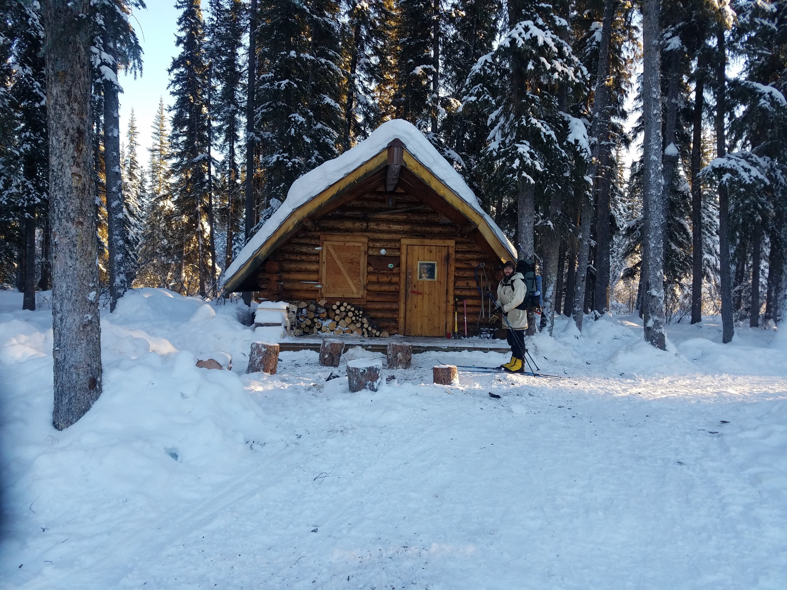 Jeff in front of Richard's cabin.jpg