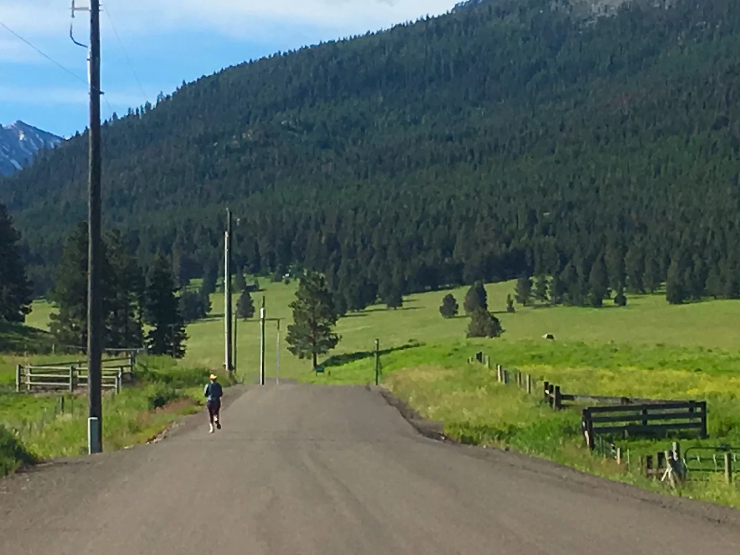 Jogger on Ski Run Road in Joseph, a common scene