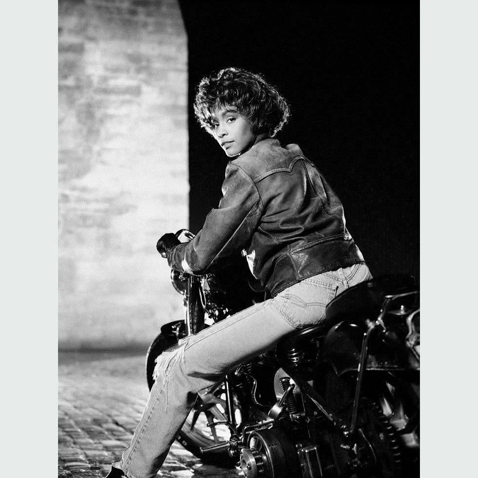 Whitney Houston on a Motorcycle, Brooklyn, NY, 1990 by Timothy White