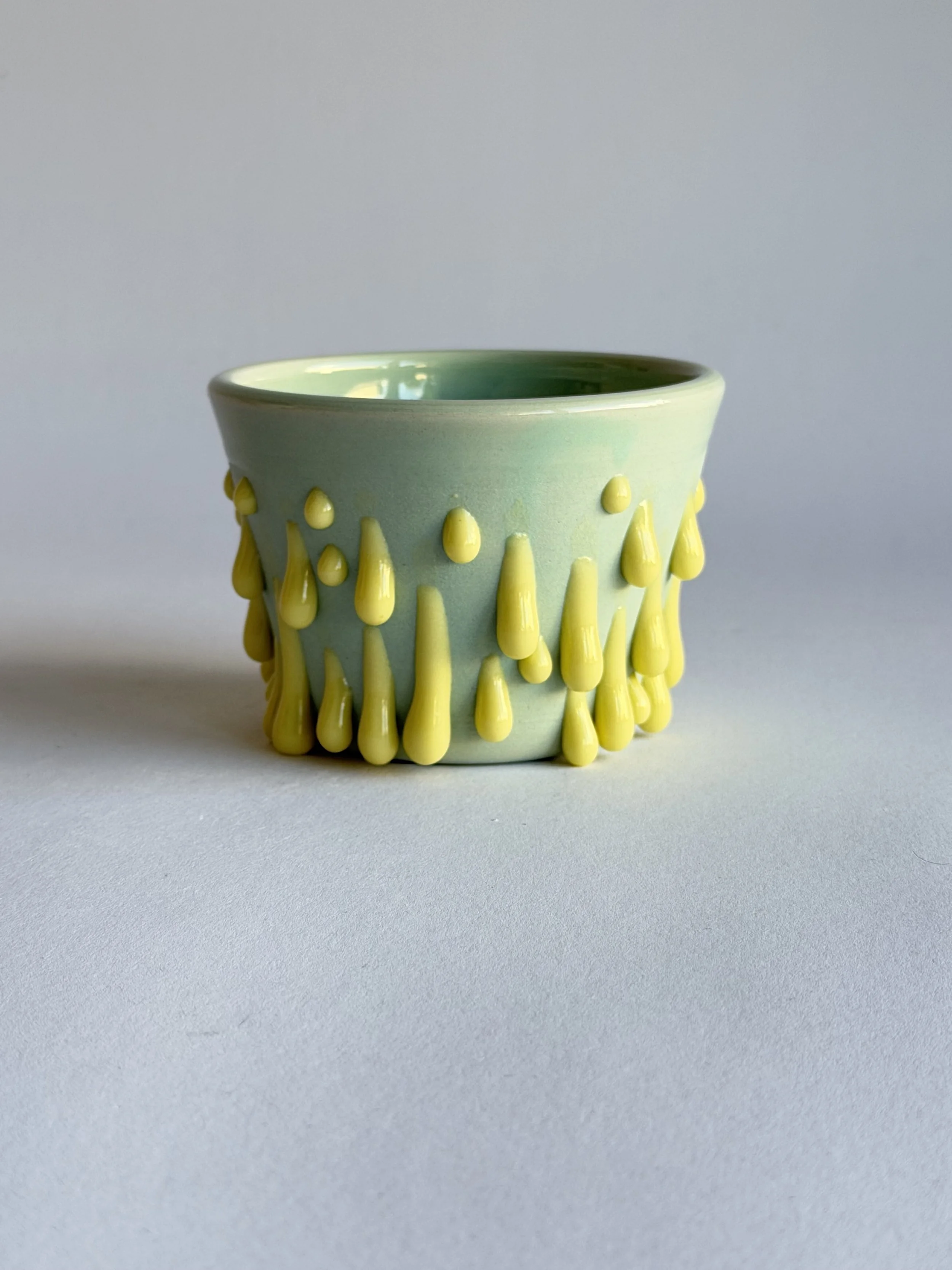 latte cup in mint green and chartreuse