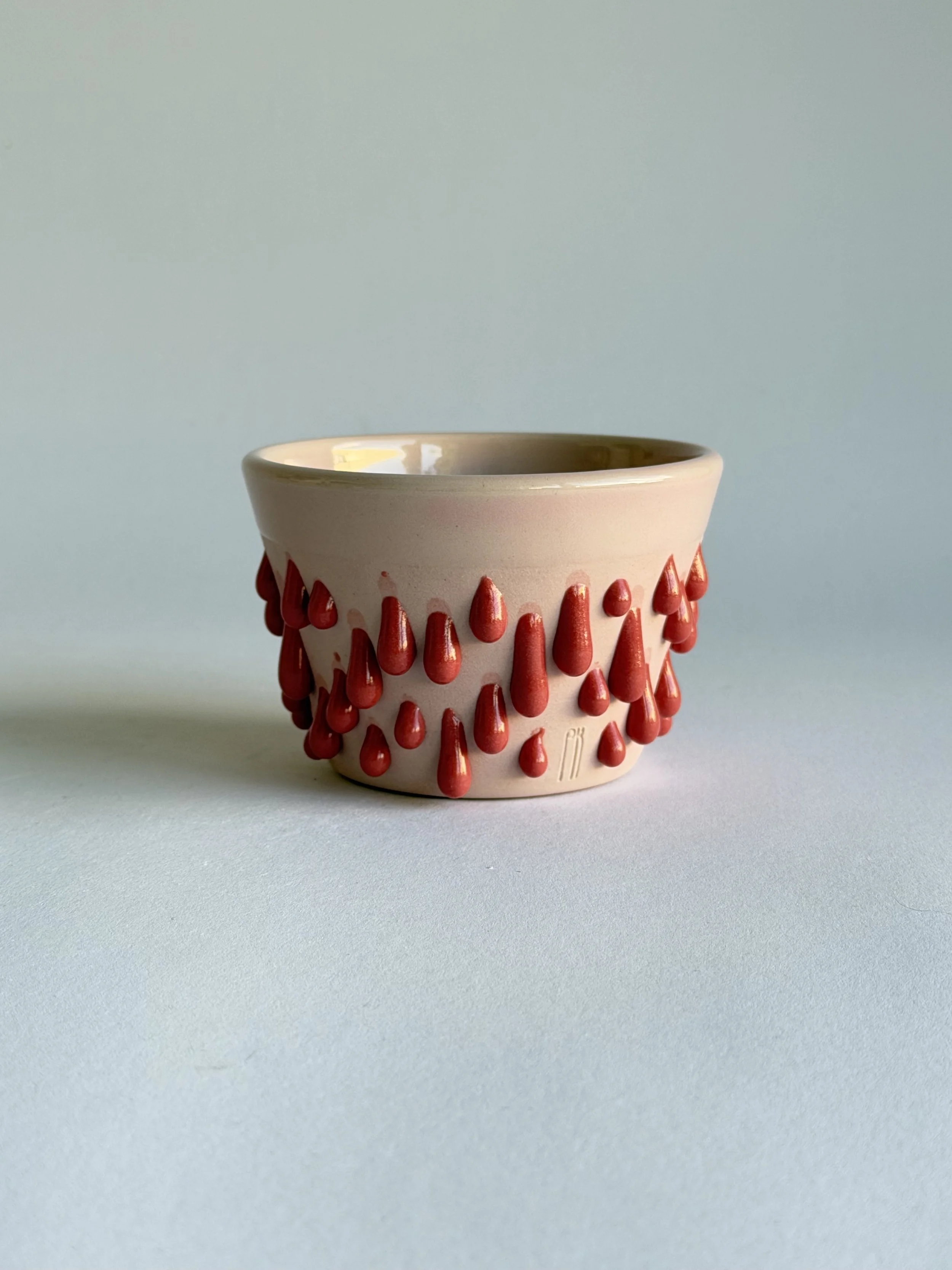 latte cup in pink and red