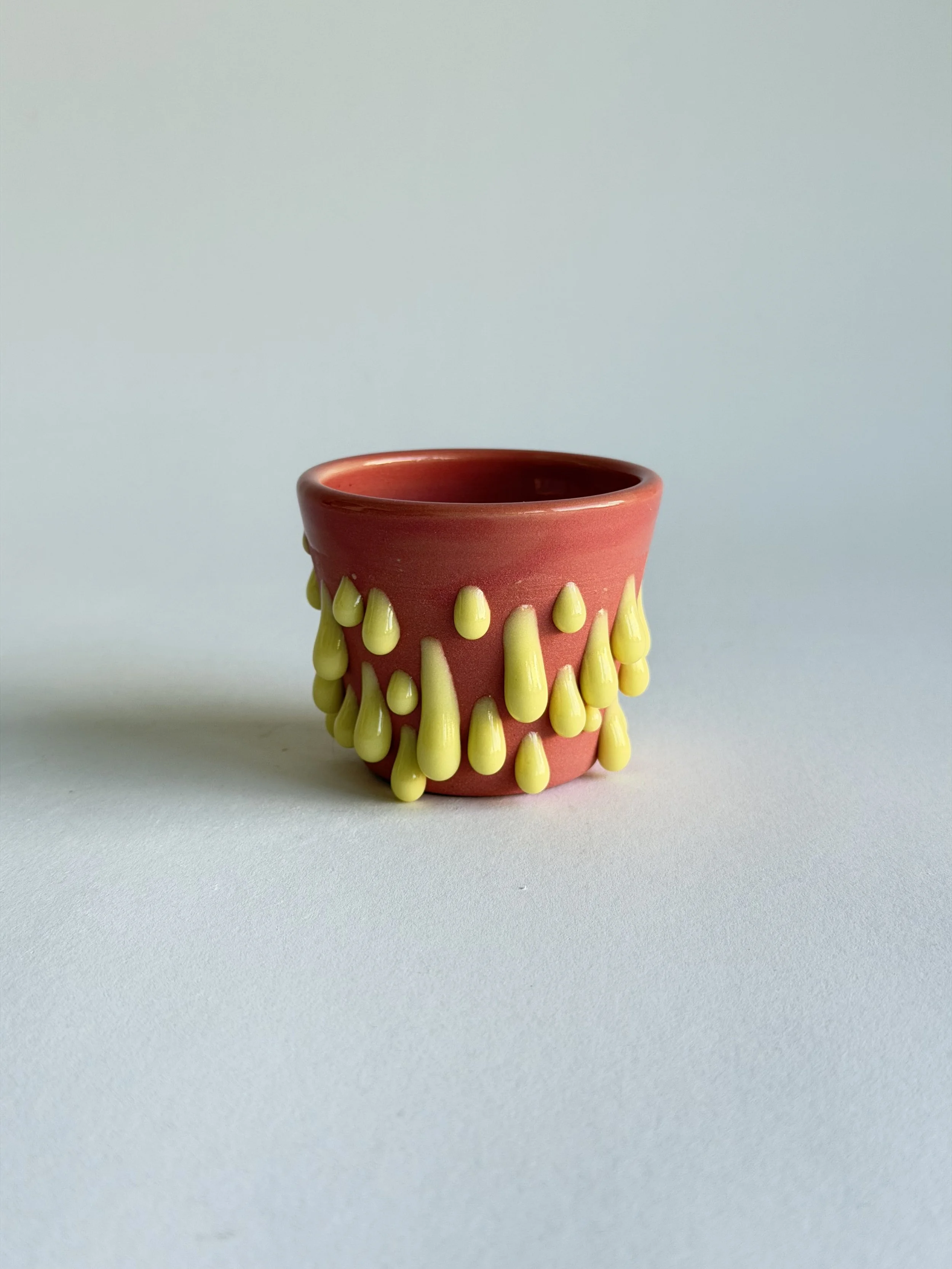 espresso cup in red and yellow