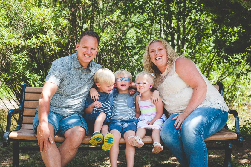 two parents and three children. three siblings with parents. summer family photos in the mountains